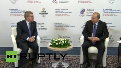 Russia: Putin meets with IOC President Thomas Bach in Moscow