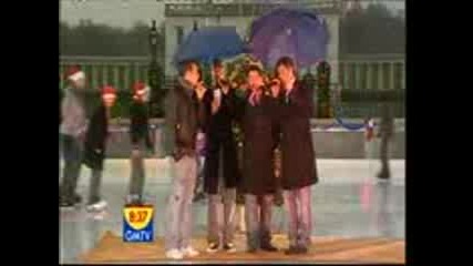 Blue Singing We Wish You A Marry Chrismas.