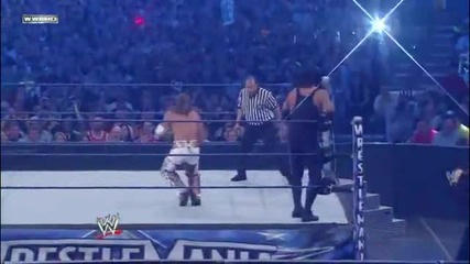 Shawn Michaels gives The Undertaker a Crotch Chop Wm25 