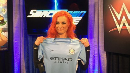 Becky Lynch feels the Sky Blues with Manchester City jersey