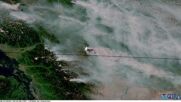 КАДРИ ОТ САТЕЛИТ: Вижте носещия се дим от хилядите горски пожари в Канада (ВИДЕО)