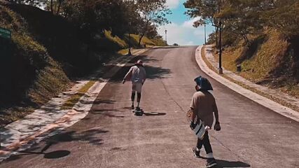 This young man masters downhill skateboarding