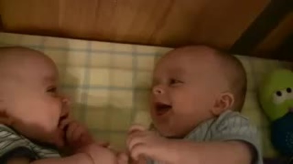 Twin Baby Boys Laughing at Each Other