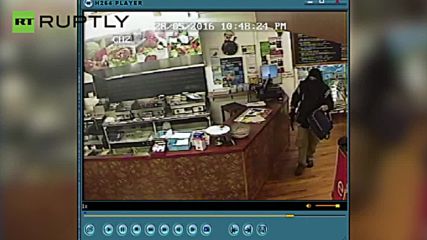 Restaurant Owner Totally Ignores Armed Robber, Continues Serving Customer