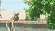 Afghan Official: 19 Police, 7 Soldiers Dead in Ongoing Siege