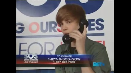 Justin Bieber on Phone at Bet Sos Help For Haiti 