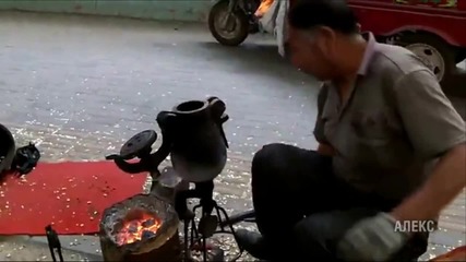 Китайски уличен търговец на пуканки