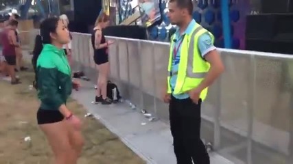 Asian girl dancing with the security guard