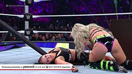 Liv Morgan sentons Ronda Rousey through a table: WWE Extreme Rules 2022 (WWE Network Exclusive)
