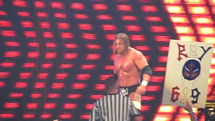 Triple H hits Randy Orton with the sledge hammer