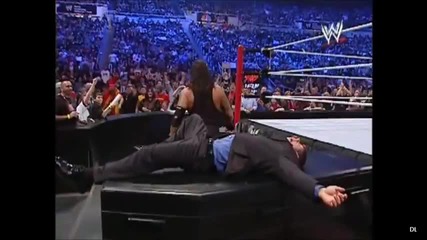Undertaker Chokeslam on Coffin