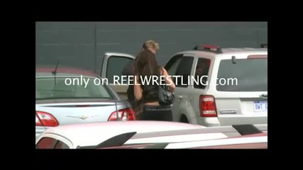 Katie Lea and Chris Jericho Y2j hug it out while Pap argues with security 