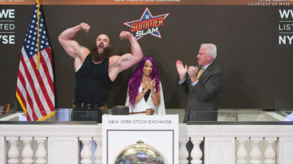 Sasha Banks and Braun Strowman ring the closing bell at the New York Stock Exchange