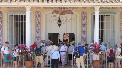 Tourists Flock to See Cuba Before the Floodgates Open