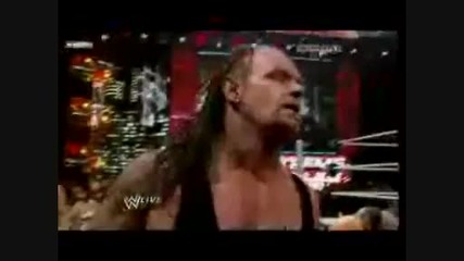 Leg Drop on the apron - The Undertaker