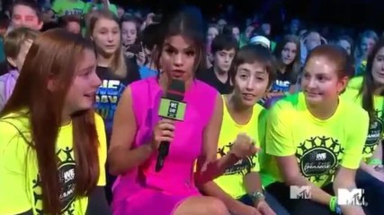 Adorable moment of Selena Gomez with a fan at we day Vancouver 2014