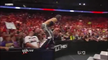 Flying Clothesline off the barricade - John Morrison