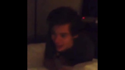 Harry Styles talking with baby Lux