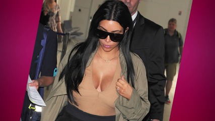 Kim Kardashian Shows Baby Bump in Low Cut Body Suit; Talks Morning Sickness