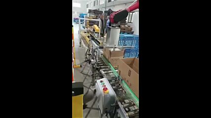 Система за подреждане на продукт в кутия с помощта на 6-осен робот