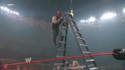 Edge throws Undertaker of the Ladder through four Tables
