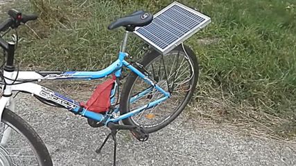 Solar Powered Electric Bicycle With A Front Hub Motor Permanent Magnets