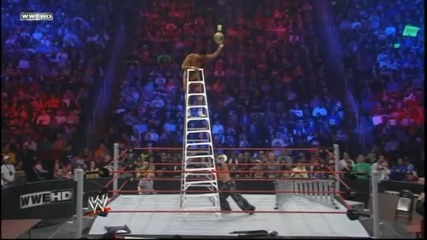 Rey Mysterio throws Alberto Del Rio off a Ladder throught a Table