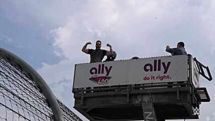 Sheamus waves the green flag at NASCAR's Ally 400