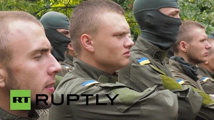 Ukraine: Azov Battalion recruits compete on obstacle course