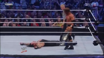 Triple H hits a Chair Shot on The Undertaker