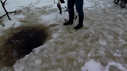 brave girl winter swimming under ice in Estonia