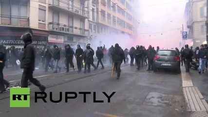 Italy: Anti-Expo Milano activists clash with police during May Day rally