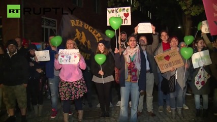 Berliners Welcome Busloads of Refugees to Germany With Open Arms