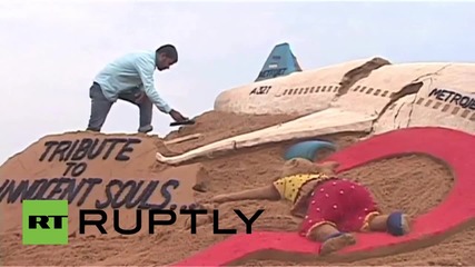India: Artist creates 7K9268 plane sand sculpture in tribute to victims