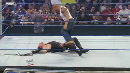 Batista attacks World Heavyweight Champion Undertaker
