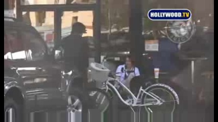 Miley Cyrus and boyfriend Justin Gaston ride bikes