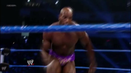 Mysterio & Cara се избазикват с Darren Young & Titus O'neil