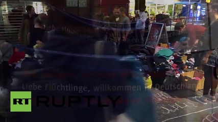 Germany: Cheering crowds give refugees a warm welcome in Frankfurt