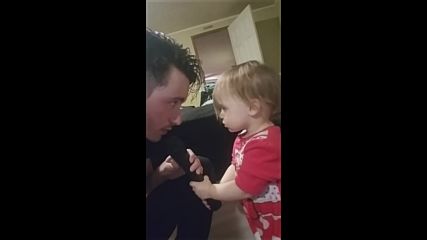 Man sings German Lullaby to his daughter