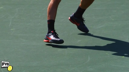 Close - up footage of Roger Federers footwork 