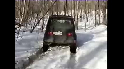 Suzuki Samurai on deep Snow 33 Super swamper tsl 