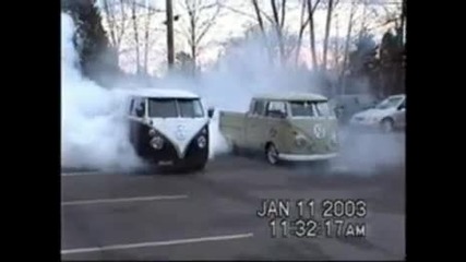 two Volkswagen bus doing crazy Burnouts