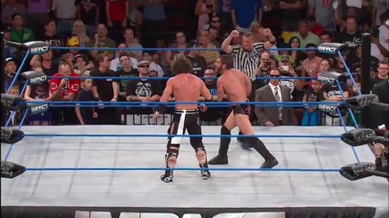 Мач за Екс - Дивизионната титла на T N A - Крис Сейбин срещу Маник срещу Остин Ерийс.