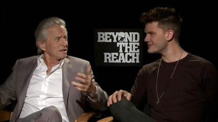 Michael Douglas And Jeremy Irvine in 'Beyond The Reach' Interview