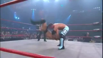 Scoop Slam followed by Knee Drop - Aj Styles