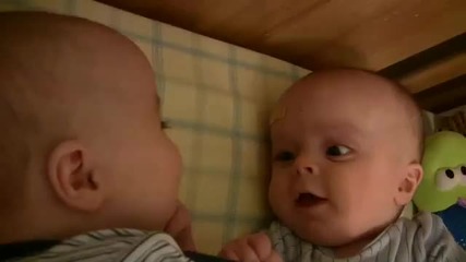Twin Baby Boys Laughing at Each Other 