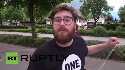 Germany: Anti-G7 activists rally against "hot air" leadership with hyper-realistic balloons