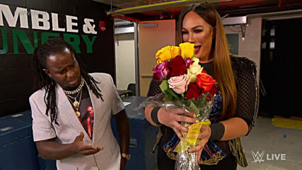 Angel Garza presents flowers to Nia Jax: Raw, April 26, 2021