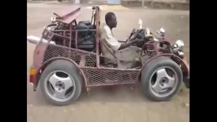 Вижте този африканец каква кола си направи от скрап!