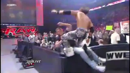 John Morrison - Jumping Knee Strike in opponent on the Barricade